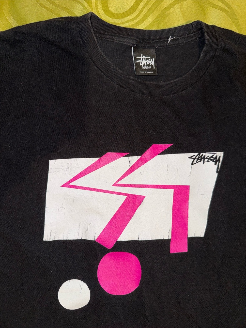 VTG Stüssy Black Graphic Tee with Pink & White Print